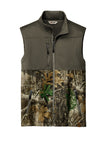 Front View of CrgBr/RTEd Russell Outdoors Realtree Atlas Colorblock Soft Shell Vest RU604
