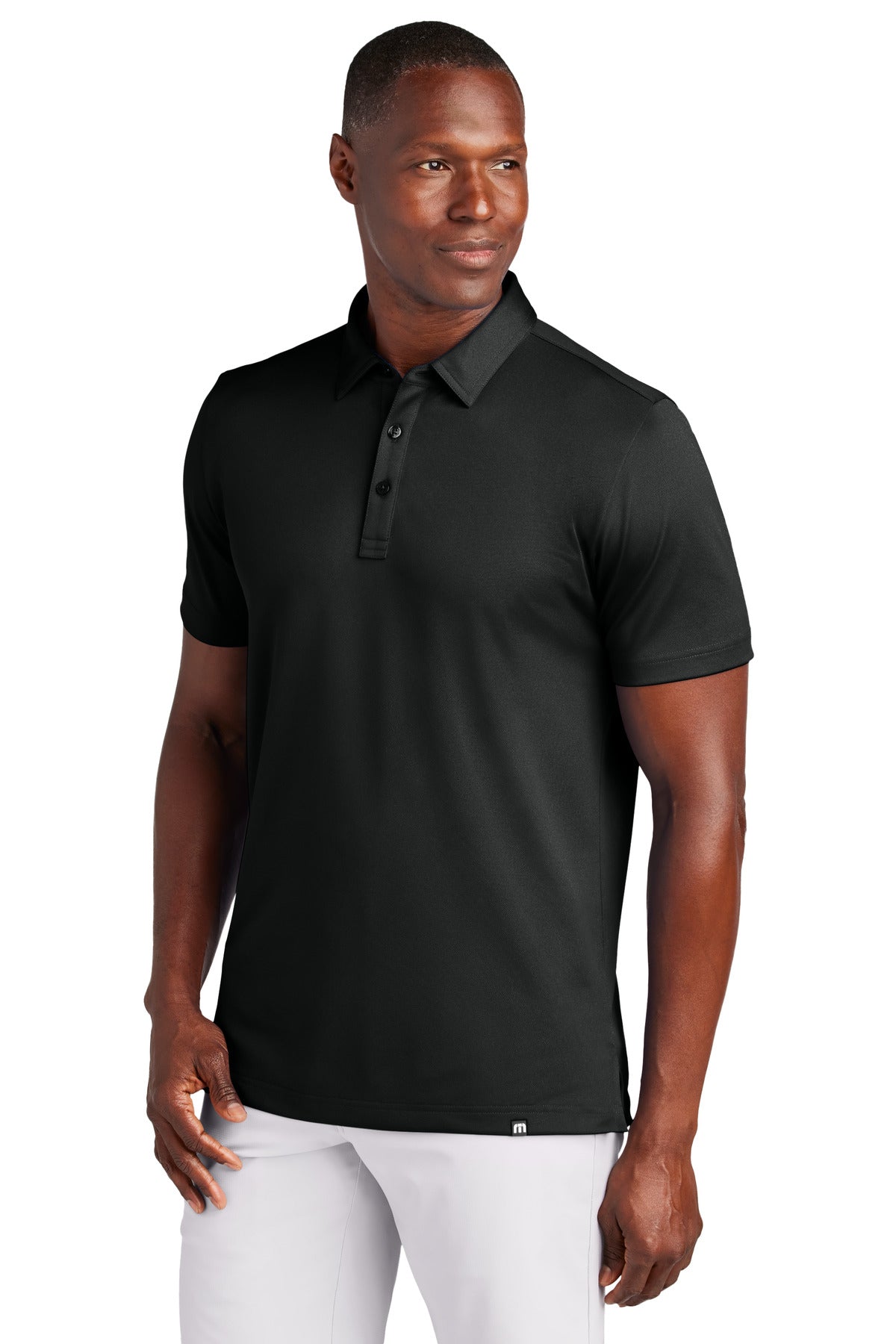 Front View of Black TravisMathew Cabana Solid Polo TM1MAA370