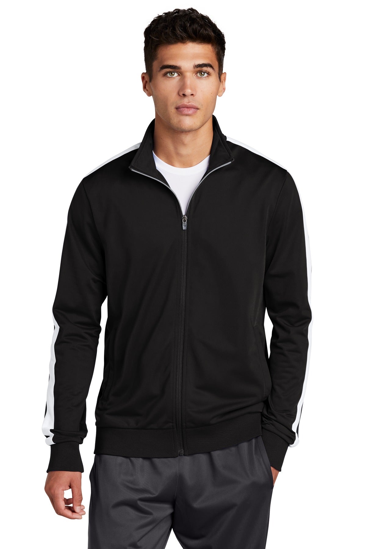 Front View of Black/White Sport-Tek Tricot Sleeve Stripe Track Jacket. JST94