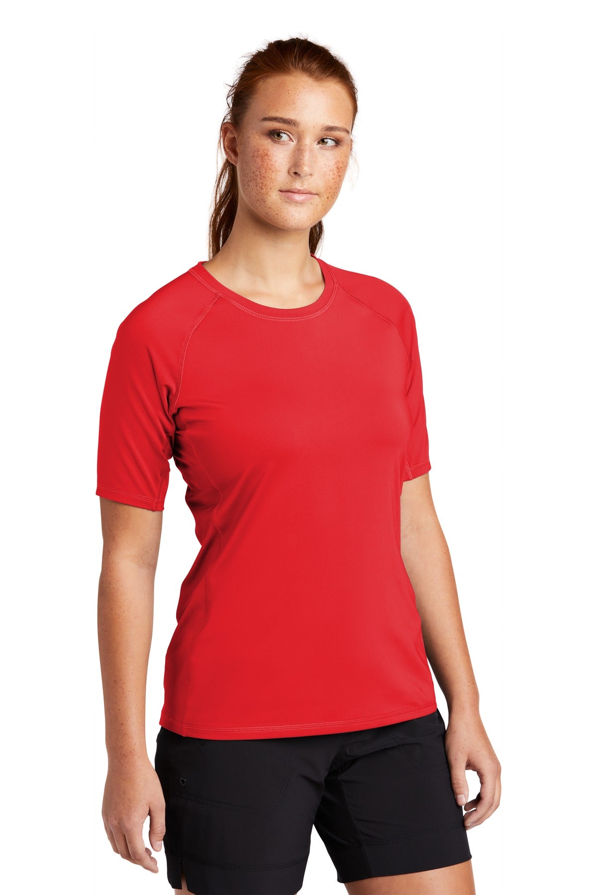 True Red Sport-Tek Women's Rashguard Tee. LST470