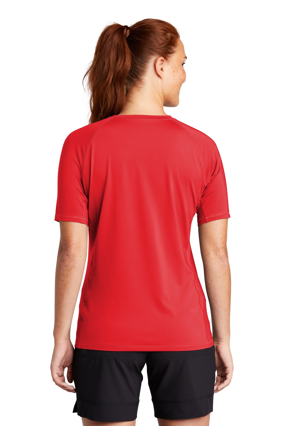 True Red Sport-Tek Women's Rashguard Tee. LST470